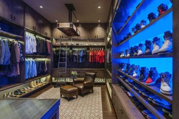 modern-mens-spacious-closet-design-with-neon-blue-light-shoe-wall-shelf