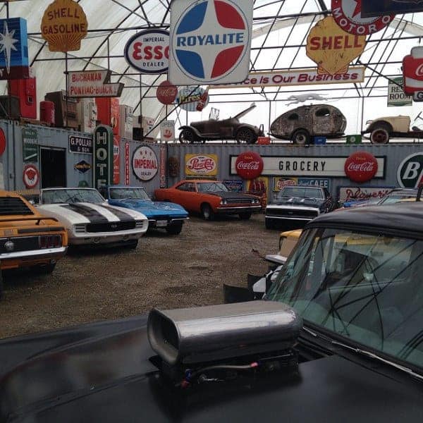 muscle-car-mens-dream-garage-with-vintage-automotive-signs