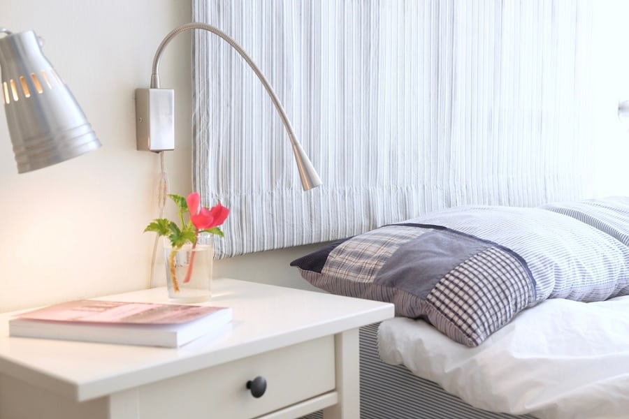 Cream nightstand in bedroom