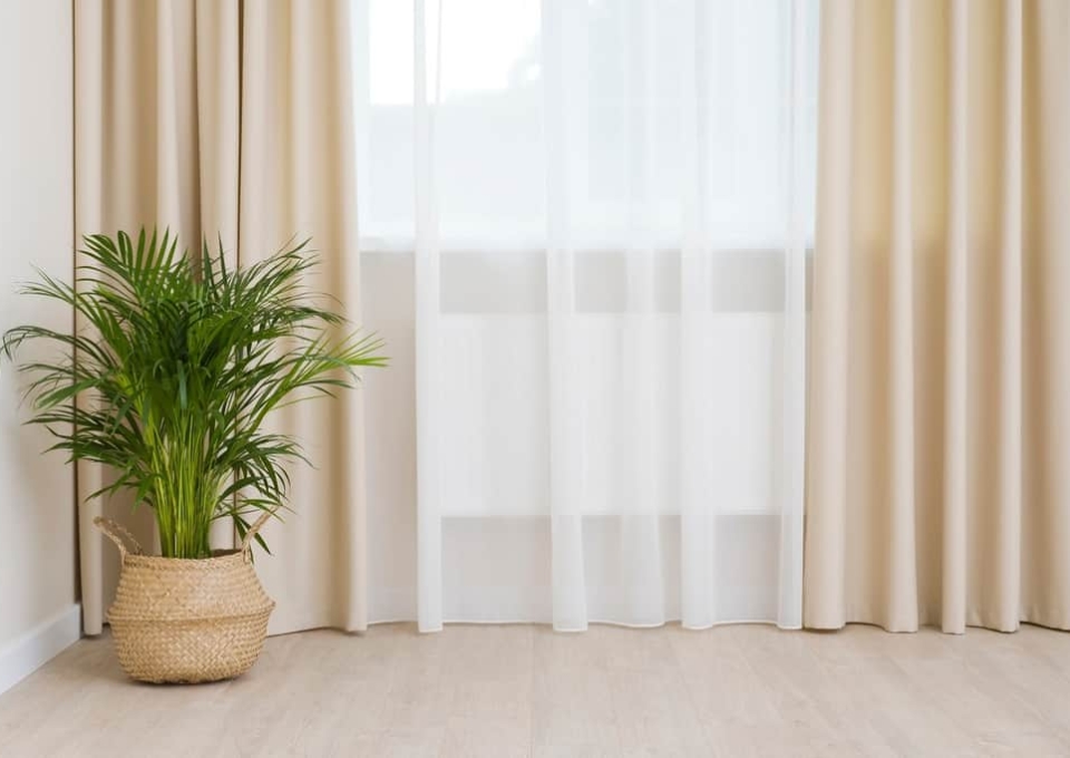 living room with curtained window